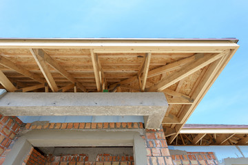 Wall Mural - Low angle view of new home under construction