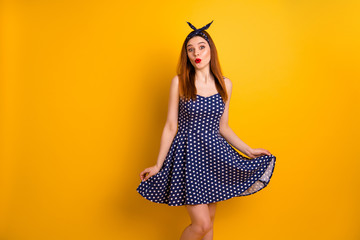 Poster - Portrait of her she nice-looking attractive lovely girlish flirty funny cheerful cheery straight-haired girl posing in cocktail dress isolated over bright vivid shine yellow background