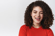 © Cookie Studio - Close-up sassy confident charismatic flirty girl dark curly hairstyle winking cheeky smirking self-assured flirting sensually talking lively boyfriend standing happy rejoicing good mood