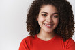 © Cookie Studio - Tenderness, emotions happiness concept. Charismatic attractive smiling girl dark curly hairstyle look happily rejoicing smiling teeth grinning lively enjoy perfect day hair salon, white background