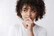 © Cookie Studio - Headshot thoughtful creative smart attractive curly-haired woman thinking new concept plan design look up touching lip take decision mind, recall name, remember interesting idea white background