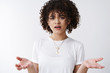 © Cookie Studio - Wtf going on. Puzzled intense young attractive girlfriend shrugging hands spread sideways frowning perplexed express full disbelief doubt cannot understand what happened confused white background