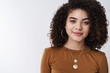 © Cookie Studio - Close-up sassy good-looking stylish curly-haired mixed-race successful brunette woman smiling sensually pleased confident look camera sincere delighted good result, waiting beauty salon