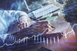 © peshkova - Financial forex charts displayed on woman's hand taking notes background. Concept of research. Double exposure