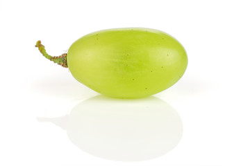 One whole fresh green grape from the side isolated on white background