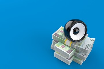 Canvas Print - Audio speaker on stack of money