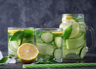 Wall Mural - summer cucumber lemonade with lemon and mint. cold drink lemonade