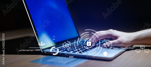 Fotografía Close up businessman hand typing or working on laptop for programming about cybe