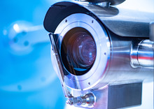 Video Camera In A Metal Case With A Cleaner. Video Surveillance In Production. Moistureproof Camera. Shock Resistant Camera. Video Camera For Installation In Places With Harsh Environmental Conditions