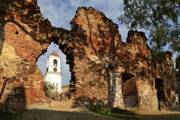 Vyborg, Russia - 05.21.2019: view of the Clock Tower from the ruins of the Cathedral.