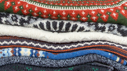 Wall Mural - Stack of knitwear and cardigans background