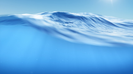ocean or sea in half water half sky. rays of sunlight shining from above penetrate deep clear blue w
