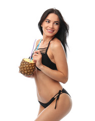 Canvas Print - Beautiful young woman in black bikini with cocktail on white background