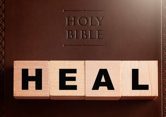 Wall Mural - Heal Spelled in Blocks on a Leather Holy Bible