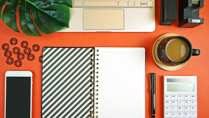 Canvas Print - Business and finance desk workspace concept with stylish masculine accessories and high tech laptop on stylish brown background.