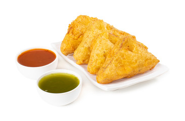 Indian Fried Snack Bread Pakora. It is also known as bread bhaji. A common street food, it is made from bread slices, gram flour, and spices among other ingredients