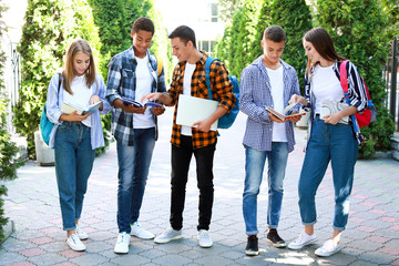 Poster - Portrait of young students outdoors