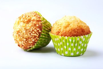 Assorted with Delicious homemade cupcakes with raisins and chocolate isolated on white background. Muffins. Top view. Copy space.