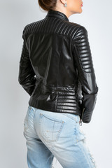 Wall Mural - Womens jacket with long sleeves, black, with an iron lock.