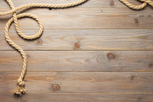 Ship Rope At Wooden Background Texture