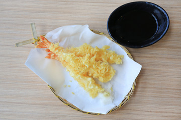 Poster - Tempura Shrimps (Deep fried shrimps) with sauce on wood table. Japanese cuisine food.