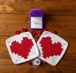 two hearts on wooden background