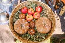 Bread Baked On Ancient Technologies, Close-up. Reconstruction Of The Pie In The Old Days. Vintage Apple Pastries, Lifestyle.