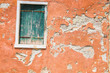 old dirty red wall and window