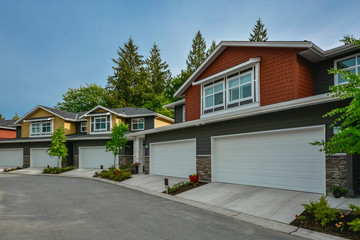 Street of brand new residential triplex houses ready for moving in