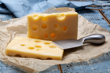 Two blocks of French emmental semi-hard cheese