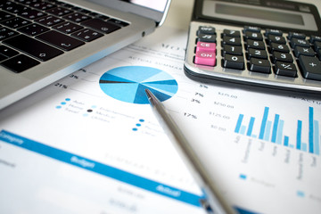 Poster - Financial graph on the desk. Accounting concept.
