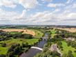 Aerial photo of the the historic Tadcaster Viaduct and River Wharfe located in the West Yorkshire British town of Tadcaster, taken on a bright sunny day