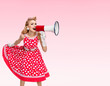 © vgstudio - happy woman holding megaphone, dressed in pin-up style red dress
