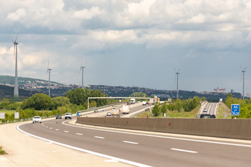 Roads Of Austria. View of Bratislava from Austria. Windmills along the road. Austria, may 2019/