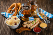 canvas print picture - October fest concept - traditional food and beer served at event