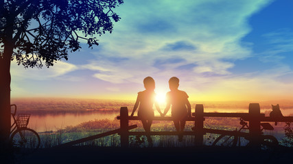 Wall Mural - Boy and girl hold hands looking at setting sun after a bike ride