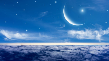 Wall Mural - romantic moon in starry night over clouds