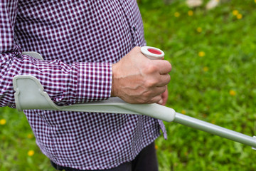 Canvas Print - Senior men holding  assistive cane