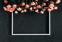 Beautiful Flowers Dark Composition. Pink Rose Flowers On Black Stone Background. Flat Lay, Top View, Copy Space