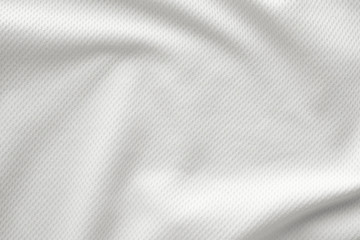 Wall Mural - White sports clothing fabric jersey football shirt texture top view close up