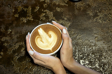 Close-Up Of Woman Holding Coffee