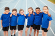 © Monkey Business - Portrait Of Children In Athletics Team On Track On Sports Day