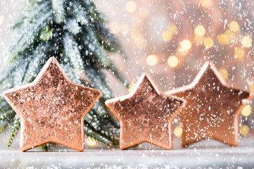 Christmas bronze decoration. Holiday decorations bronze on bokeh background.