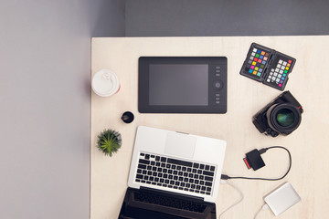 Fototapete - Photographer table with many suppiles. Top view, flat lay.