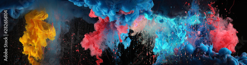 Illustration: Acrylic blue and red colors in water. Ink blot. Abstract black background. Acrylic blue and red colors in water. Ink blot. Abstract black background.