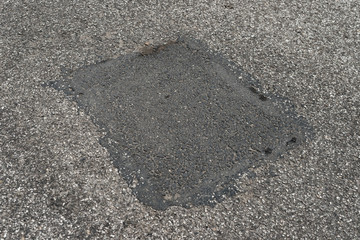 asphalt road crack patch damage