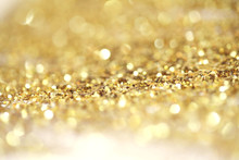 Gold (bronze) Glitter Shine Dots Confetti. Abstract Light Blink Sparkle Defocus Backgound.