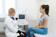 © Kate - Professional doctor advises the patient young girl after ultrasound