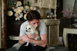 © Daniel Pieterson - Cute and old chihuahua dog enjoying cuddeling