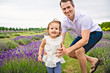 © Louis-Paul Photo - Happy family father and daughter having fun in lavender field